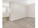 Spacious carpeted living room with access to kitchen and ample natural light at 8720 Yardley Ct # 108, Indianapolis, IN 46268