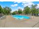 Inviting community pool with lounge chairs and a shaded gazebo at 8720 Yardley Ct # 108, Indianapolis, IN 46268