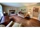 Inviting living room featuring a fireplace, hardwood floors, and comfortable seating at 902 N Bauman St, Indianapolis, IN 46214