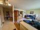 Inviting living room featuring hardwood floors and a cozy, patterned area rug at 902 N Bauman St, Indianapolis, IN 46214