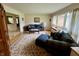 Comfortable living room with large windows offering plenty of natural light at 902 N Bauman St, Indianapolis, IN 46214
