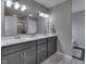 Modern bathroom featuring double sinks, a quartz countertop, and a walk-in shower at 928 Ridge Rock Ln, Bargersville, IN 46106