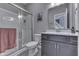 Bathroom with a glass-enclosed shower, vanity, and contemporary finishes at 928 Ridge Rock Ln, Bargersville, IN 46106