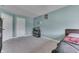 A serene bedroom with neutral walls, plush carpet, and an aquarium feature at 928 Ridge Rock Ln, Bargersville, IN 46106