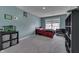 Bedroom features large window, neutral color, carpet, and an aquarium at 928 Ridge Rock Ln, Bargersville, IN 46106