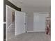 Cozy bedroom features soft carpet, white trim, and natural light at 928 Ridge Rock Ln, Bargersville, IN 46106