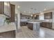 Spacious kitchen features stainless appliances, an island, and modern cabinets at 928 Ridge Rock Ln, Bargersville, IN 46106