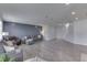 Expansive living room with hardwood floors and comfortable seating at 928 Ridge Rock Ln, Bargersville, IN 46106
