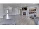 Inviting living space with hardwood floors, fireplace, and open access to the kitchen at 928 Ridge Rock Ln, Bargersville, IN 46106