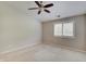Neutral bedroom with a ceiling fan and a view of the outdoor area at 1074 Timber Creek Dr # 8, Carmel, IN 46032