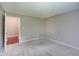 Neutral bedroom featuring carpet, walls painted in neutral color, and closet access at 1074 Timber Creek Dr # 8, Carmel, IN 46032