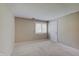 Neutral bedroom featuring carpet, walls painted in neutral color, and natural light at 1074 Timber Creek Dr # 8, Carmel, IN 46032