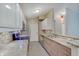 Bright kitchen featuring stainless steel appliances, granite counters, and modern cabinetry at 1074 Timber Creek Dr # 8, Carmel, IN 46032