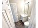 A stylish bathroom features a modern vanity, updated lighting, and coordinating fixtures at 10922 Snowdrop Way, Indianapolis, IN 46235