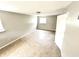 Neutral bedroom featuring tile flooring, fresh paint, and a window for natural light at 10922 Snowdrop Way, Indianapolis, IN 46235