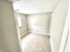 Cozy bedroom featuring tile flooring, fresh paint, and a window for natural light at 10922 Snowdrop Way, Indianapolis, IN 46235