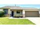 Charming single-Gathering home with a well-maintained lawn and attached garage, situated on a sunny day at 10922 Snowdrop Way, Indianapolis, IN 46235