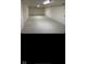 Spacious, unfinished basement featuring concrete floors, white walls, and ample room for storage and customization at 1101 E 25Th St, Muncie, IN 47302