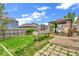Expansive backyard featuring a gazebo, playground set, and raised garden beds at 11254 N Sashing Way, Monrovia, IN 46157