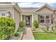 Inviting front exterior featuring manicured bushes and fresh landscaping at 11254 N Sashing Way, Monrovia, IN 46157