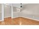 Bright living room with light gray walls and wood-look flooring, offering an open and airy space at 11254 N Sashing Way, Monrovia, IN 46157