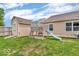 Backyard features a playground set that is perfect for children to play and have fun at 11254 N Sashing Way, Monrovia, IN 46157
