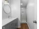 Bathroom features a sleek vanity with a modern faucet and a tiled shower stall at 1127 Junco Dr, Columbus, IN 47203