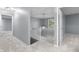 Second floor hallway with carpet and white railing, leading to bedrooms and other living spaces at 1127 Junco Dr, Columbus, IN 47203
