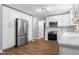 Gorgeous eat-in kitchen features stainless appliances, including French door refrigerator at 1127 Junco Dr, Columbus, IN 47203