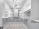 A well-organized walk-in closet with custom shelving and ample storage space at 1127 Junco Dr, Columbus, IN 47203