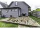 Backyard with a deck, grill, and gray siding is perfect for grilling and relaxing at 1201 Villa Ave, Indianapolis, IN 46203
