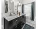 Modern bathroom with dual sinks, sleek vanity, and contemporary fixtures at 1201 Villa Ave, Indianapolis, IN 46203