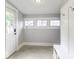 Bright mudroom features coat hooks, natural light, and neutral paint at 1201 Villa Ave, Indianapolis, IN 46203