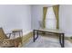 Comfortable home office with natural light, modern desk, and accent chair at 1201 Villa Ave, Indianapolis, IN 46203
