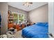 Cozy bedroom featuring ample natural light and closet space, perfect for relaxation at 1245 Elm Grove Ln, Greenwood, IN 46143