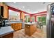 Well-equipped kitchen with stainless steel appliances and seamless access to dining area at 1245 Elm Grove Ln, Greenwood, IN 46143