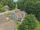 Aerial view of a well-maintained home with a charming backyard and mature trees, creating a private oasis at 1311 Old Hickory Dr, Greenwood, IN 46142
