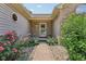 Inviting entrance with beautiful landscaping, flowers and a stone walkway leading to the front door at 1311 Old Hickory Dr, Greenwood, IN 46142