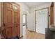 Hallway featuring detailed archways, chair rail, and views to bedroom, and front entry at 1311 Old Hickory Dr, Greenwood, IN 46142