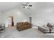 Spacious living room with vaulted ceilings and ample seating, great for entertaining at 1311 Old Hickory Dr, Greenwood, IN 46142