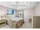 Bedroom with floral bedding, bright colors, ample natural light and unique ceiling at 1350 Inverness Farms Rd, Martinsville, IN 46151