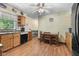 Eat-in kitchen features oak cabinets, bright light, and a cozy breakfast nook at 1350 Inverness Farms Rd, Martinsville, IN 46151
