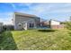 The property boasts a sprawling backyard with a trampoline and a gazebo, creating the perfect Gathering space at 1375 Crabapple Rd, Franklin, IN 46131