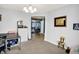 Bright living room with toys, soft carpet, and doorway to other living areas at 1375 Crabapple Rd, Franklin, IN 46131