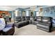 Comfortable living room with lots of seating and view into the kitchen area at 1375 Crabapple Rd, Franklin, IN 46131