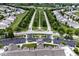 Amazing aerial view of the community entrance showcasing the tree lined street at 15937 Marsala Dr, Fishers, IN 46037