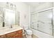 Well-lit bathroom with a vanity, toilet, and glass-enclosed shower at 15937 Marsala Dr, Fishers, IN 46037