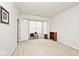 Well-lit bedroom with large window, neutral paint, and cozy chair at 15937 Marsala Dr, Fishers, IN 46037