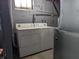 Unfinished basement area with washer and dryer at 1637 Meridian St, Columbus, IN 47201
