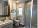 Updated bathroom with shower, modern fixtures, and neutral paint tones at 1637 Meridian St, Columbus, IN 47201
